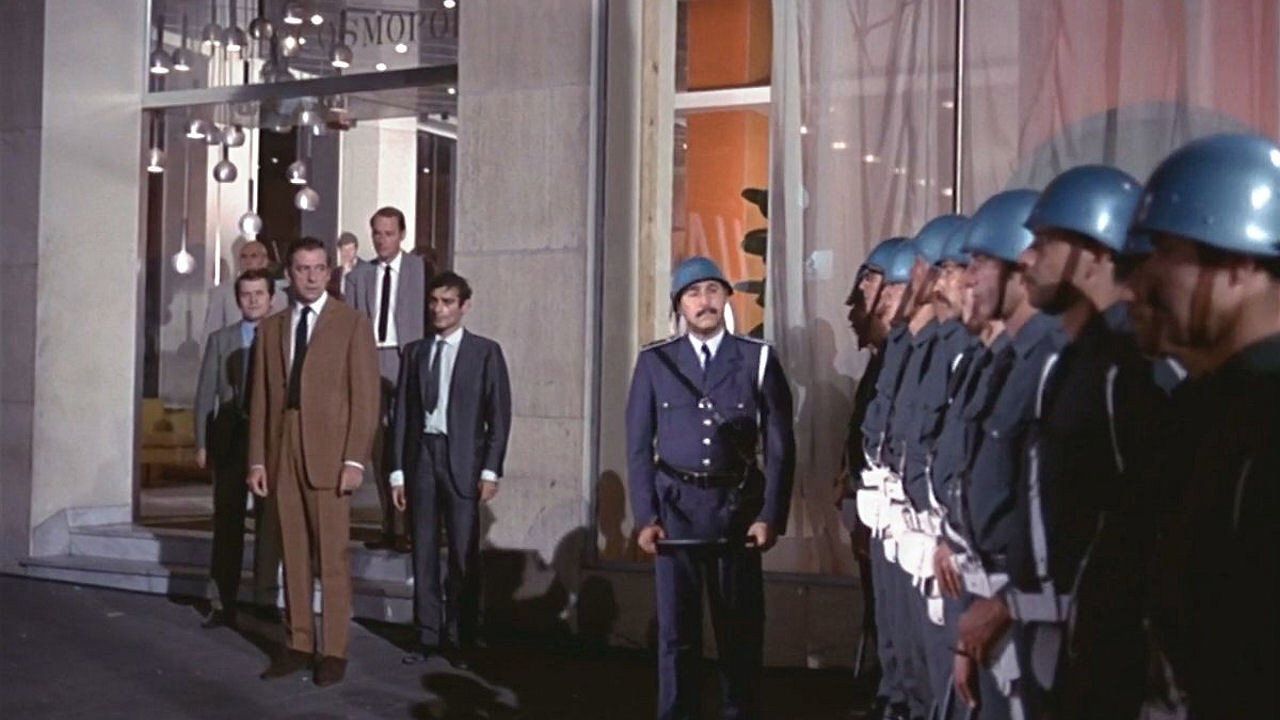 Z (1969) wallpaper #16 — 1280×720 HD backdrop — A prominent politician is murdered during a demonstration. The government and army are… — free HD background for desktop, MacBook, mobile & iPhone (ref jlShvx4NDd2Fz4yNETRKnfnqEBy)